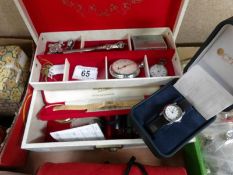 A jewellery box and contents including watches,