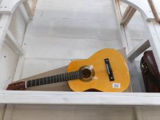 A boxed child's guitar