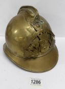 A brass French fire fighters helmet from Mirson