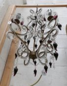 A vintage 4 light metal and glass chandelier