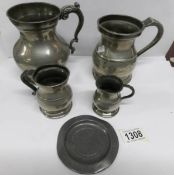 2 large and 2 smaller old pewter tankards and a small pewter tray