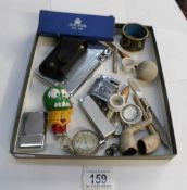 A mixed lot of cigarette lighters etc