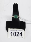 An 18ct gold ring set Russian emerald,