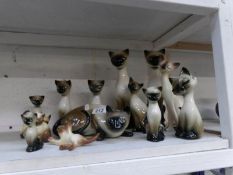 A quantity of cat figures