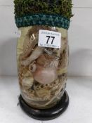 A preserved octopus in a jar