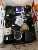 A box of photographic equipment including Nikon 500mm mirror telelens, 2 motor drives etc.