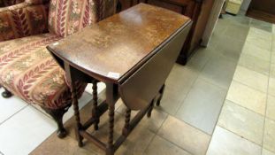 An oak barley twist gate leg table