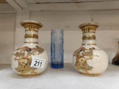 A pair of oriental vases and a Whitefriars style vase