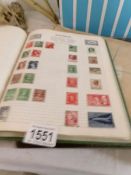 2 albums of UK and Commonwealth stamps,