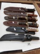 2 machete's and 4 other good quality knives all in leather sheathes