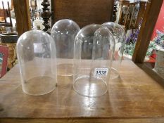 2 glass anniversary clock domes and 2 plastic examples