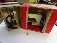 A Little Betty child's sewing machine in original box and a Merit Student microscope