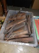 A box of wooden moulding planes