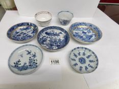 A collection of mainly Chinese 18th & 19th century tea cups and saucers,