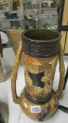 A Bretby vase with oriental and lizard depictions,