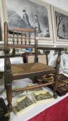 A small 19th century oak elbow chair