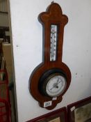 A small inlaid barometer