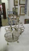 A silver plate toast rack incorporating egg cup stand and a jam dish