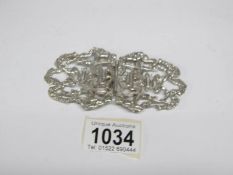 A silver nurse's buckle, hall marked London,