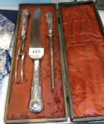 A 19th century carving set with silver handles