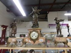 An impressive 3 piece clock garniture,