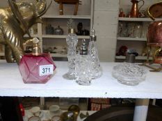 4 cut glass scent bottles and a cranberry glass scent bottle a/f