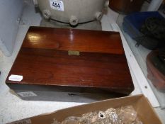 A mahogany box in need of repair