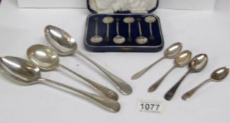 A cased set of 6 silver tea spoon and 7 other silver spoons,