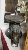 2 items of tribal art being a wooden stool and a wooden head