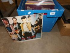 A box of LP records including David Bowie