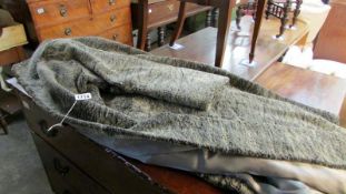 A 1940's grey fur skin coat
