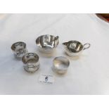 A quantity of silver plated items including Art Nouveau napkin rings