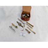 A mixed lot of tie pins and cuff links