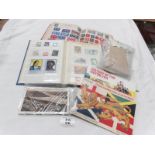 2 world stamp albums, post cards, loose stamps etc