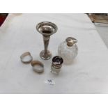 2 silver topped bottles and 3 other silver items