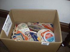 A quantity of beer mats