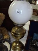 An old brass oil lamp