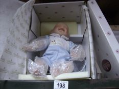 A boxed baby doll