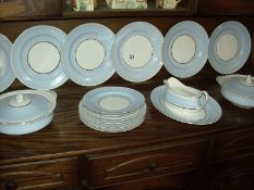 A quantity of dinner ware