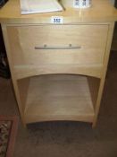 A bedside table with drawer