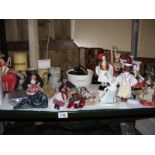 A shelf of figures etc
