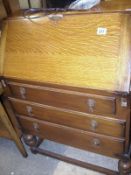 An oak 3 drawer desk