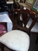 A set of 4 Victorian style mahogany dining chairs