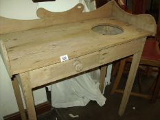 An antique pine wash stand