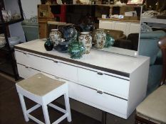 A white retro dressing table and stool