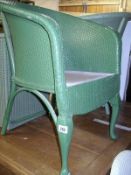 A green wicker chair