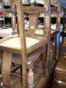 A set of 4 oak dining chairs