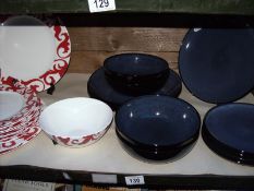 A shelf of china including plated and dishes