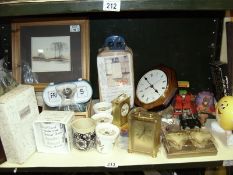 A shelf of clocks, plates etc