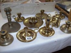 A quantity of good brass chamber candlesticks